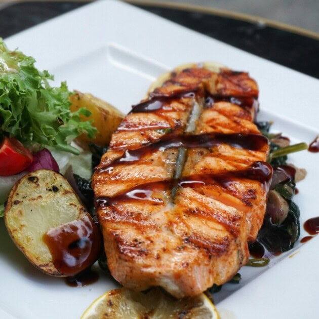 Plated food of Salmon and vegetables